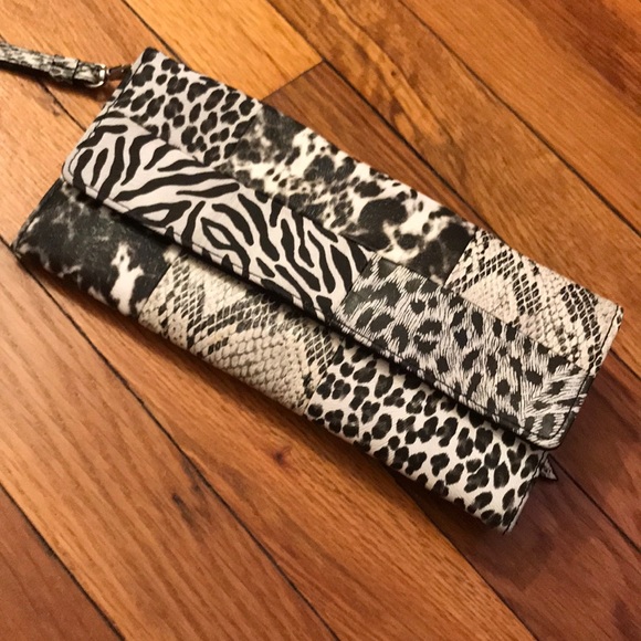 Handbags - NWOT black and white animal print clutch